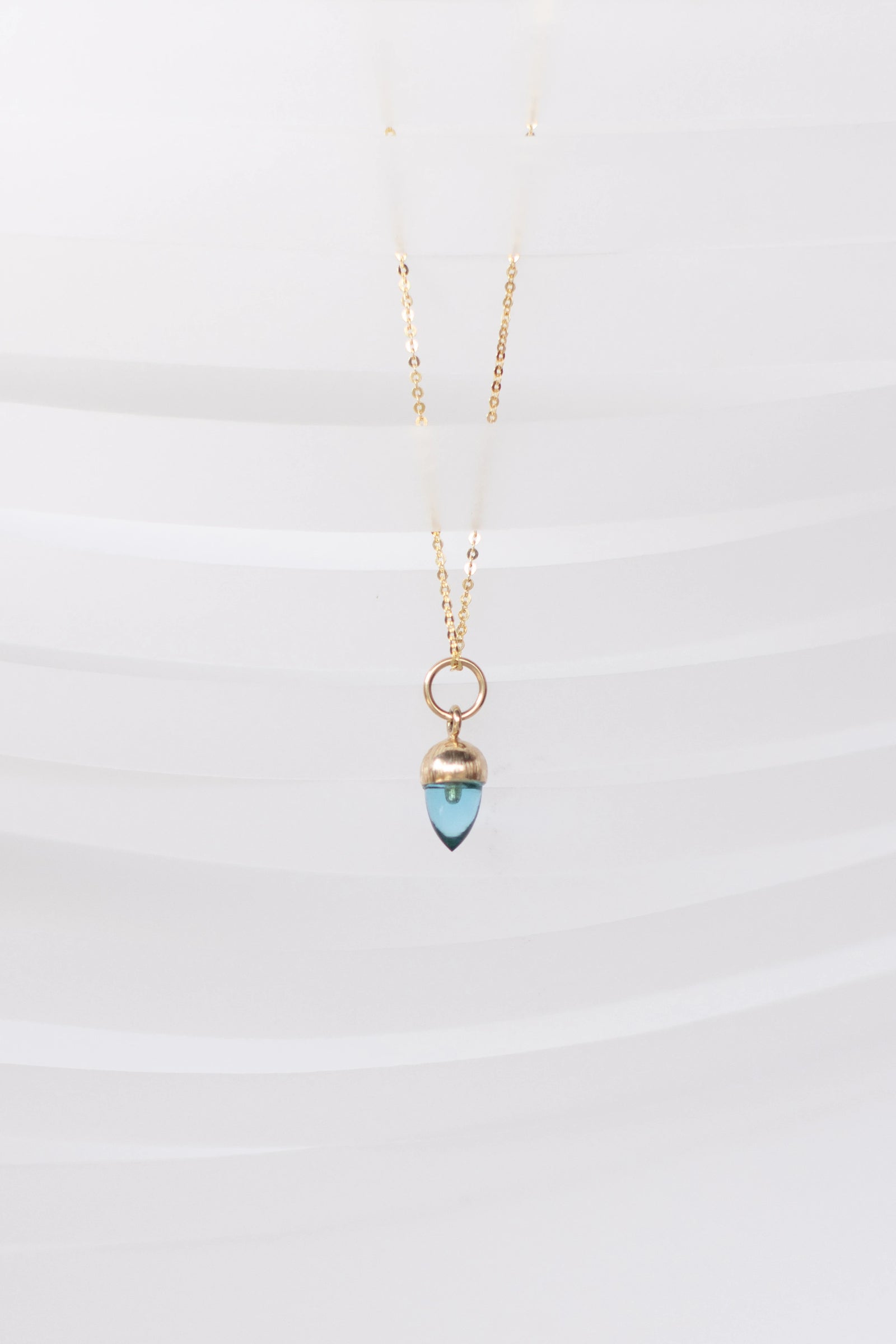 DIJE DE BELLOTA CHICA DE TOPACIO SWISS BLUE