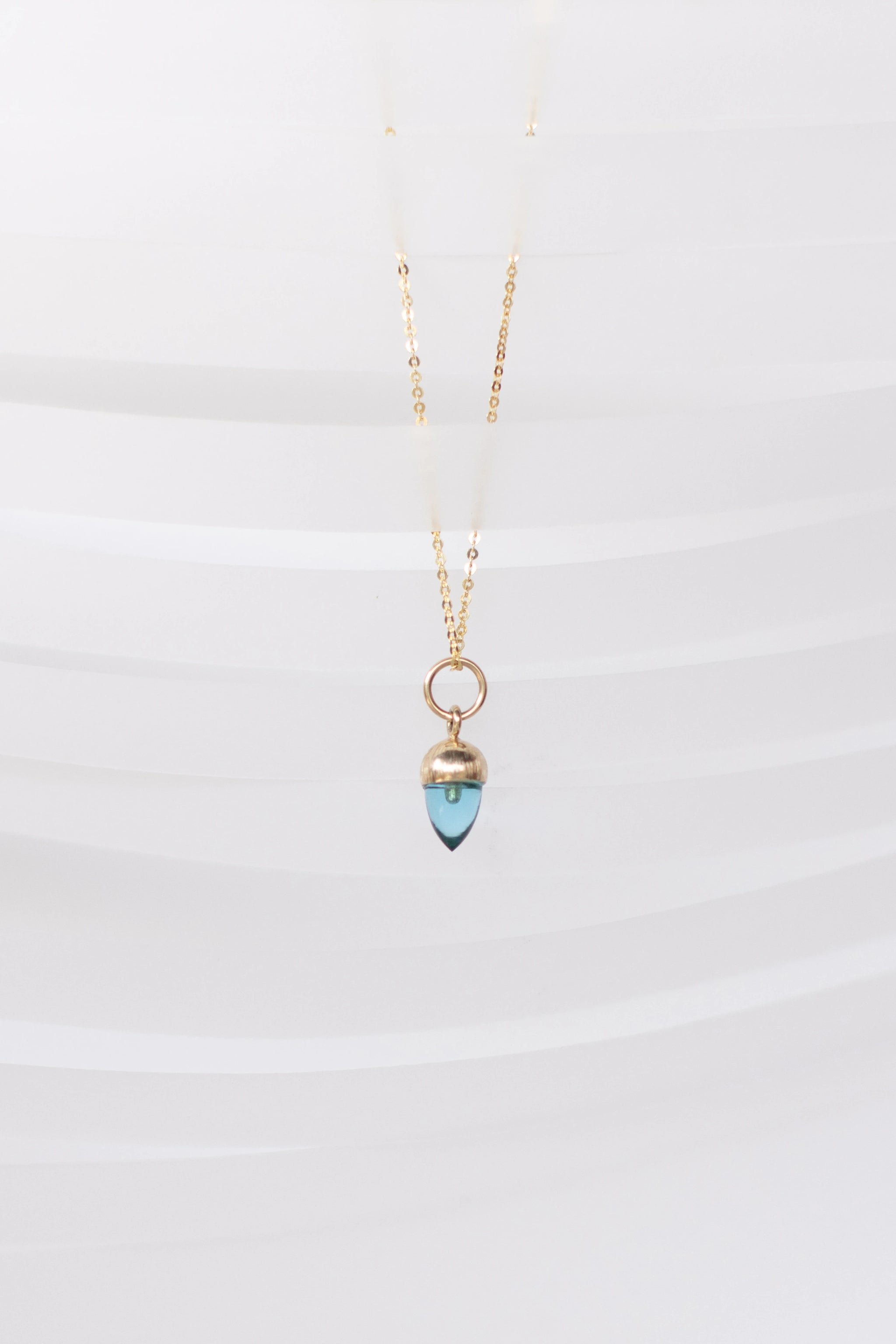 DIJE DE BELLOTA CHICA DE TOPACIO SWISS BLUE